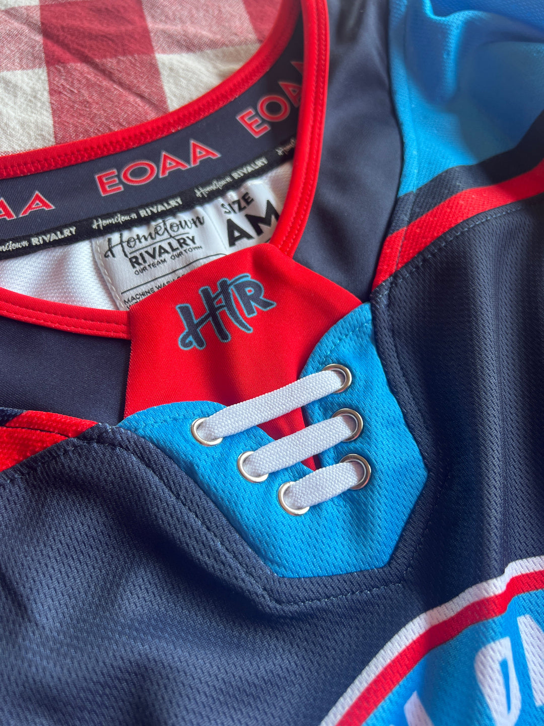 Close-up of sublimated fabric and stitching on Elite Custom Ringette Jersey
